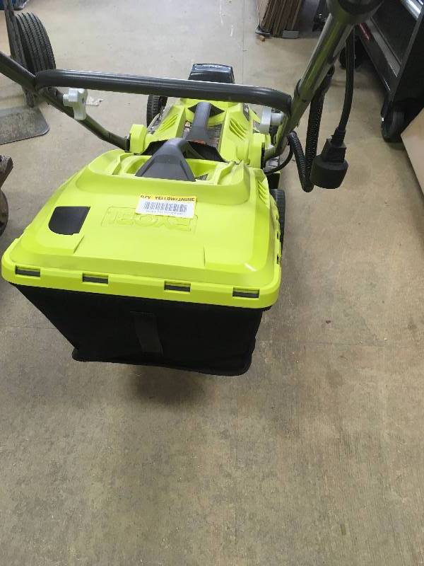 RYOBI 16 in. 13 Amp Corded Electric Walk Behind Push Mower in working conditions