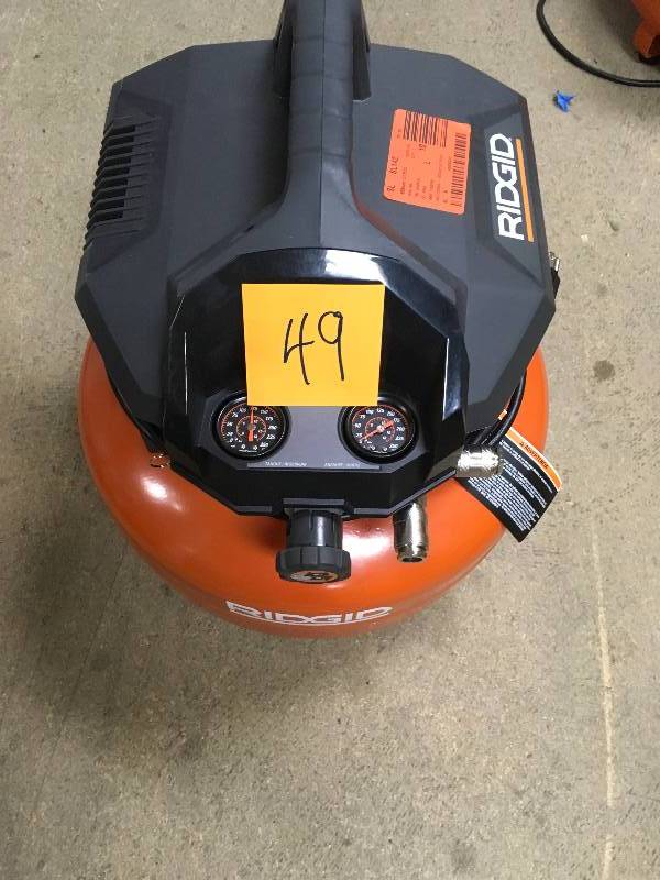Ridgid 6 Gal. Pancake Compressor in working conditions