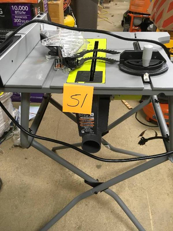 Ryobi 10 in. Table Saw with Folding Stand in working condition missing 2 botton black balance caps