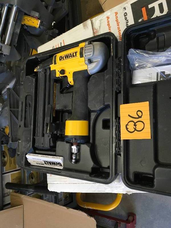 DEWALT Pneumatic Brad Nailer  Kit in working conditions