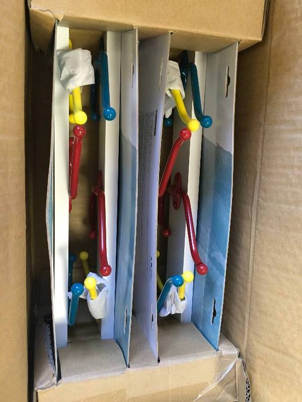 box of  Liberty 18 in. White Hook Rack with Yellow, Teal and Red Hooks New