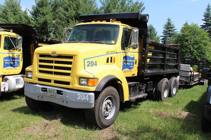 lot 2 image: 1999 Sterling Ox Bodies Dual Axle Dump Truck w Commercial Hitch