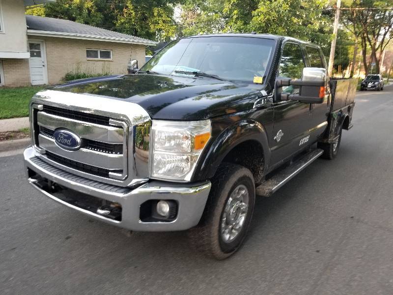 lot 1 image: 2012 Ford F350 Super Duty 4 x 4 Crew Cab Pick UP