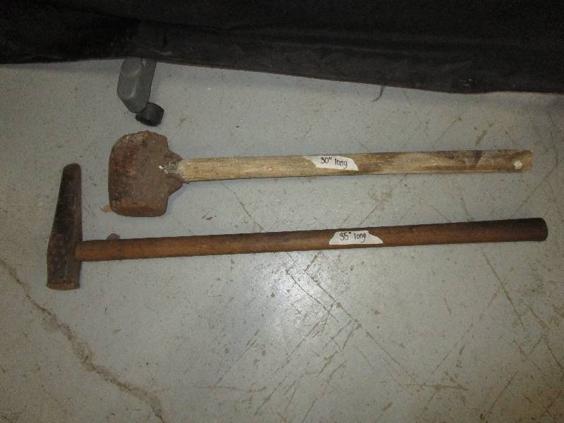 lot 110 image: Antique maul and hammer, maul is 30 long and hammer is 35 long