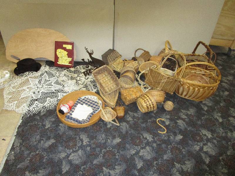 lot 158 image: Doilies, wilkon county history book, part of a weather vane,tons of baskets,pine cones