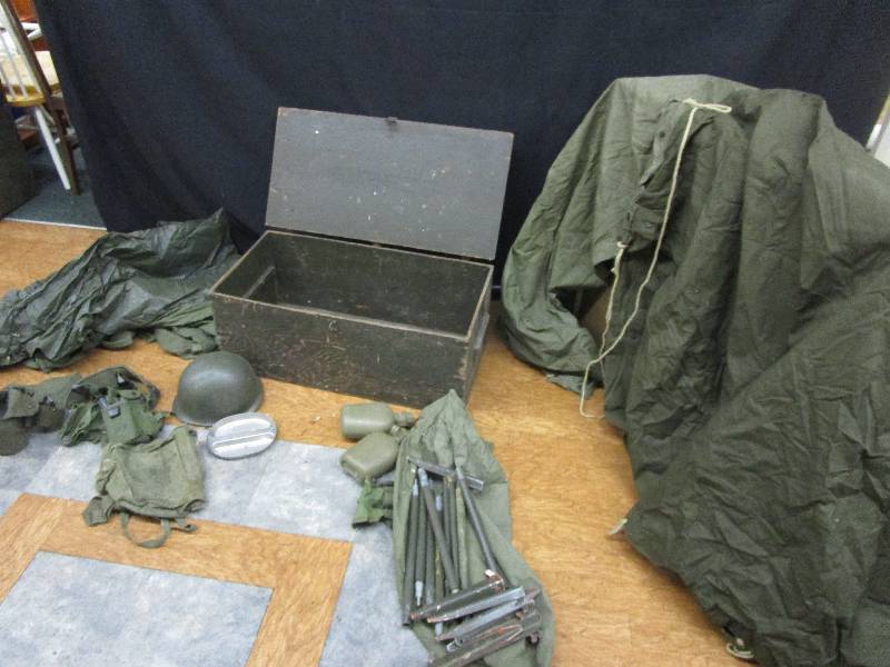 lot 189 image: trunk full of millitary stuff. Trunk is 32X16X13, military tent