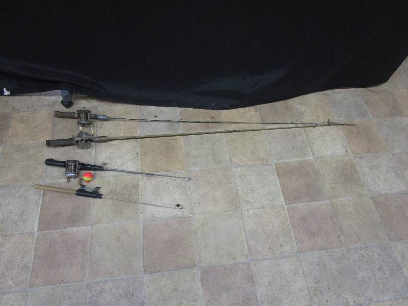 lot 195 image: fishing poles and reels. Shakespear 1920 wonder reel model PH, reel on fiber glass pole(some damage) criterion level winding 1960 shakespear, on steel pole JC higgins model 47B