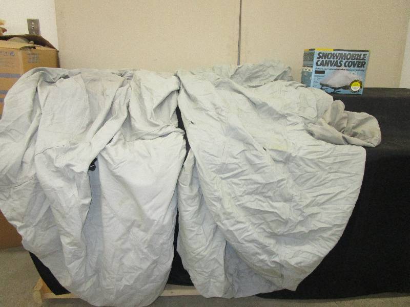 lot 20 image: 2 Snowmobile Canvas Covers, Small Hole on One