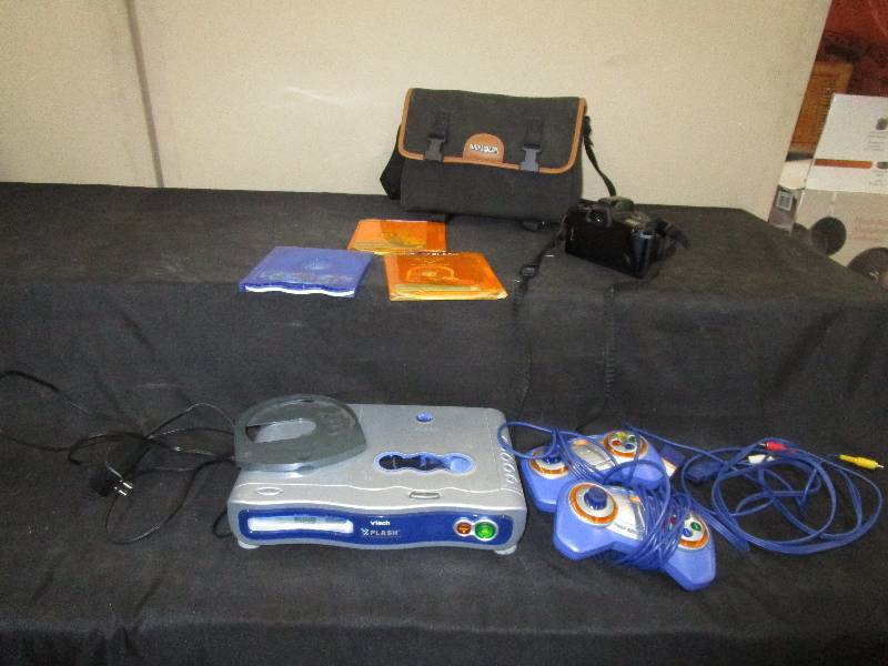 lot 61 image: Film Camera, Minolta 3xi Camera, Vtech System with 2 Controllers, 3 Games (see pictures)