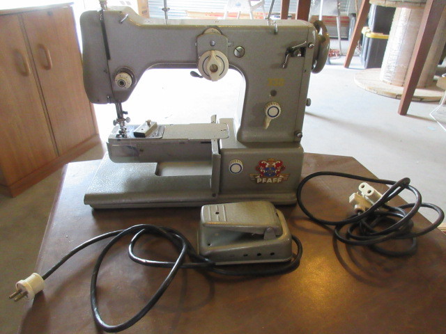 lot 108 image: PORTABLE SEWING MACHINE