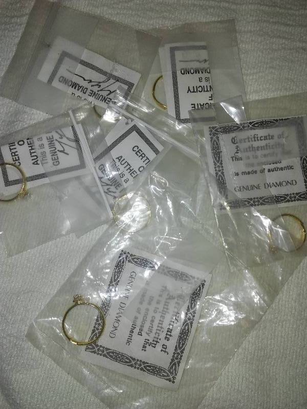lot 133 image: 7 diamonds adjustable toe rings, COA