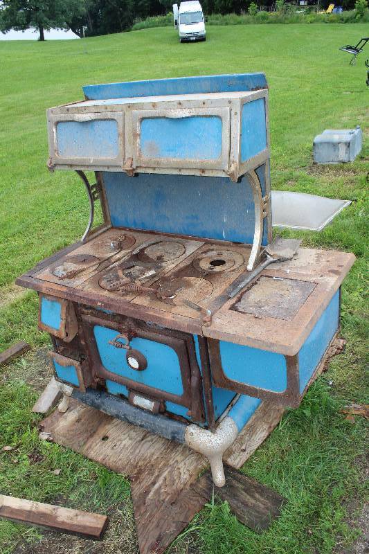 lot 513 image: 7-Burner Wood Burning Cook Stove with water warming container