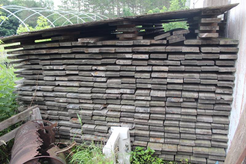 lot 512 image: Lot of (40) 2x8 Green Treated Lumber