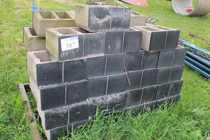 lot 387 image: Lot of (43) Black Face Concrete Cinder Blocks