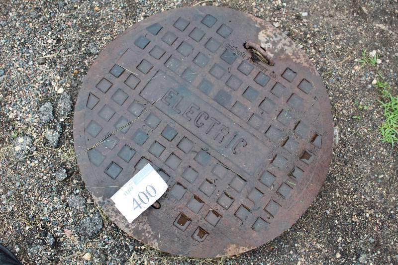 lot 400 image: Neenah Foundry Electric Man Hole Cover