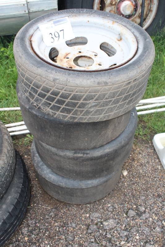 lot 397 image: Lot of (4) Goodyear 20.0x6.0, Firestone 20.4x6.2 Racing Tires w Rims