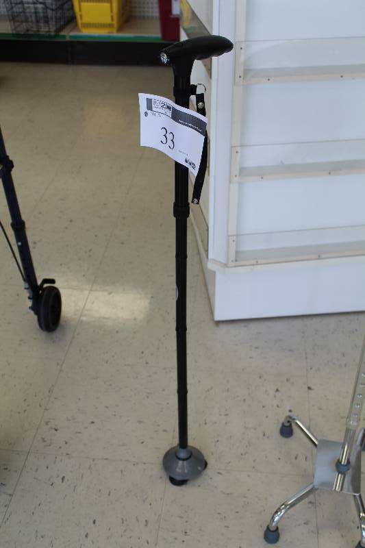 lot 33 image: Walking Cane w 3-legs