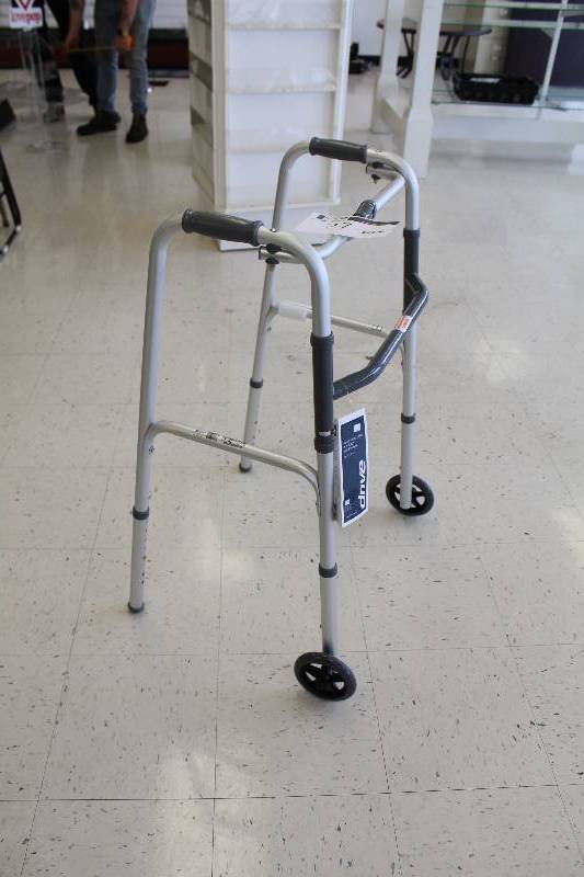lot 27 image: Drive Medical HX5 9JP Deluxe Folding Walker