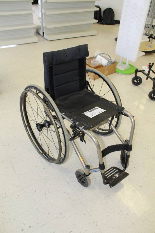lot 38 image: Invacare A4 Titanium Wheel Chair w Spinergy Wheels