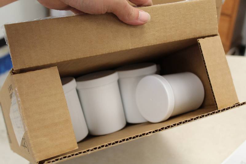 lot 123 image: Centor White Plastic Ointment Jars w Standard Closures