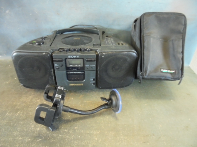 lot 25 image: Portable RadioCassetteCD Player and More