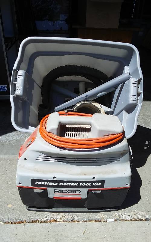 lot 15 image: Ridgid Portable Electric Tool Vac With Accessories