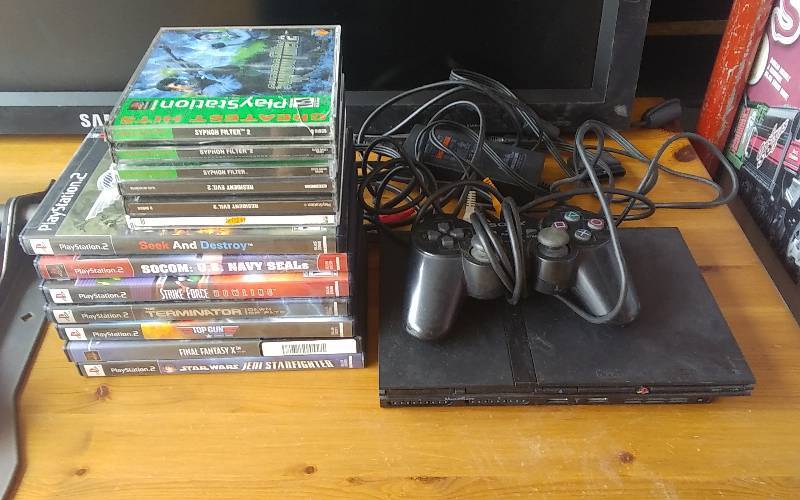 lot 60 image: PS2 Slim Console With Power, AV, 1-Controller & Games