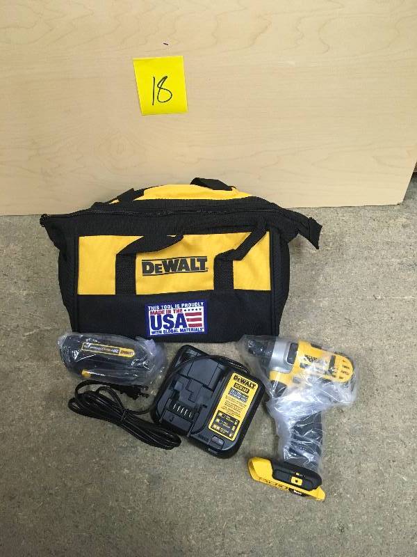 lot 18 image: DEWALT 20-Volt MAX Lithium-Ion Cordless 14 in. Impact Driver with Battery 1.3Ah, Charger and Contractor Bag not used