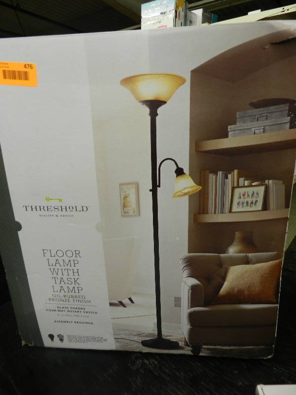 Threshold floor lamp with store shelves assembly