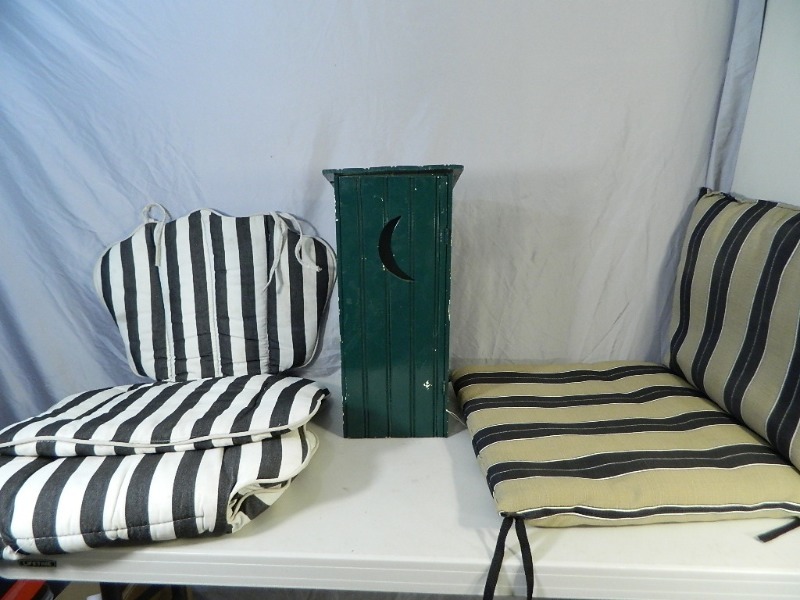 lot 86 image: Outdoor Cushions and Cute Toilet Paper Holder