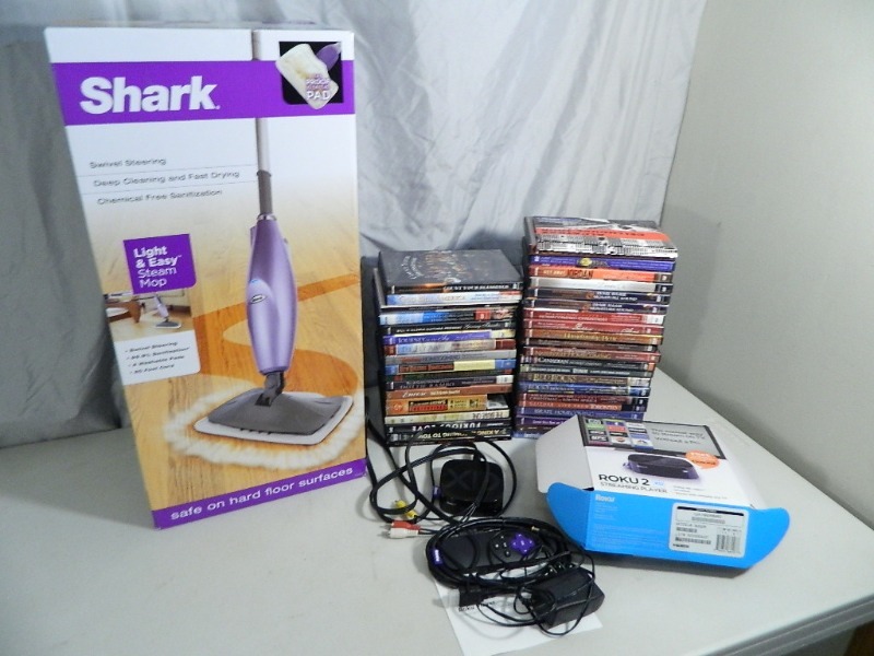 lot 123 image: New Shark Steam Mop, Roku, DVDs, Etc