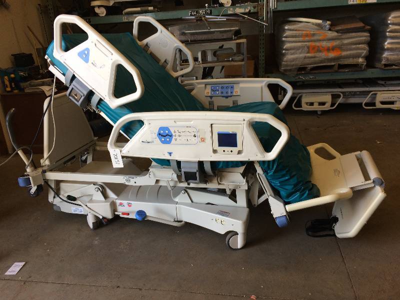 lot 6 image: WOW Retails New $22,000 Hill-Rom P1900 TotalCare Hospital Bed With Adjustable Air Flow Mattress, Scale, Digital Screen & Performs Chair Position - Excellent Working Condition  See Youtube 