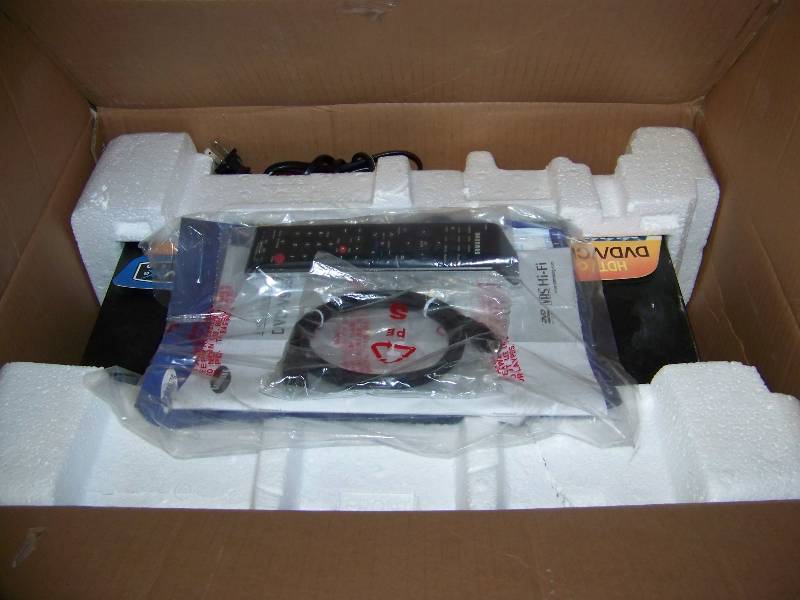 lot 95 image: Samsung, DVD  VCR Combo Player with HDMI Output and Remote Control in Original Box