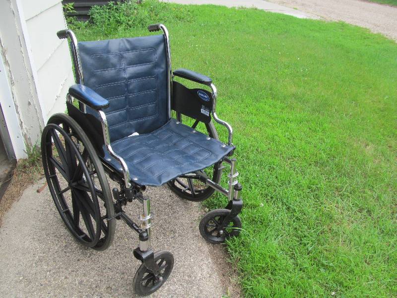 lot 4 image: Invacare Wheelchair
