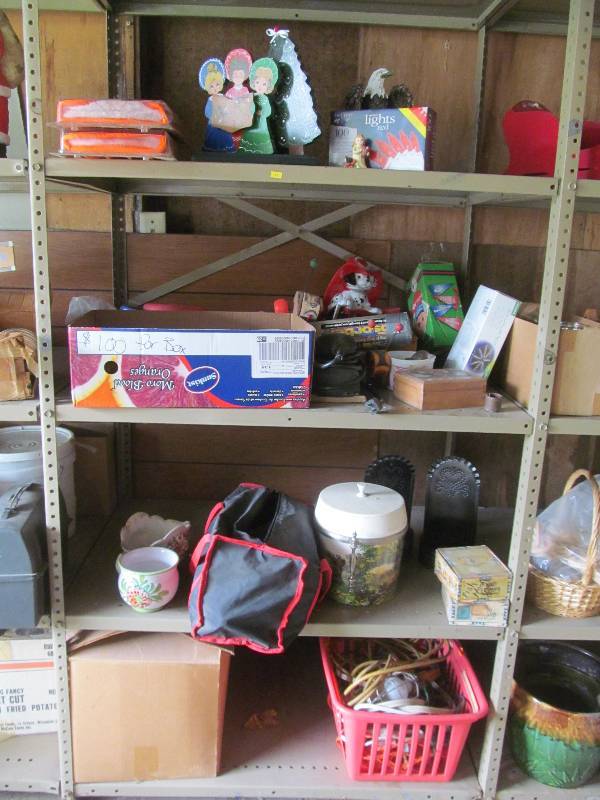 lot 59 image: Winter Mits, extension cords, dolls, coffee cups, ice bucket, Vintage toys, Eagle Statue, Patio Umbrella Lights, Fish Hooks, auto Power Brush