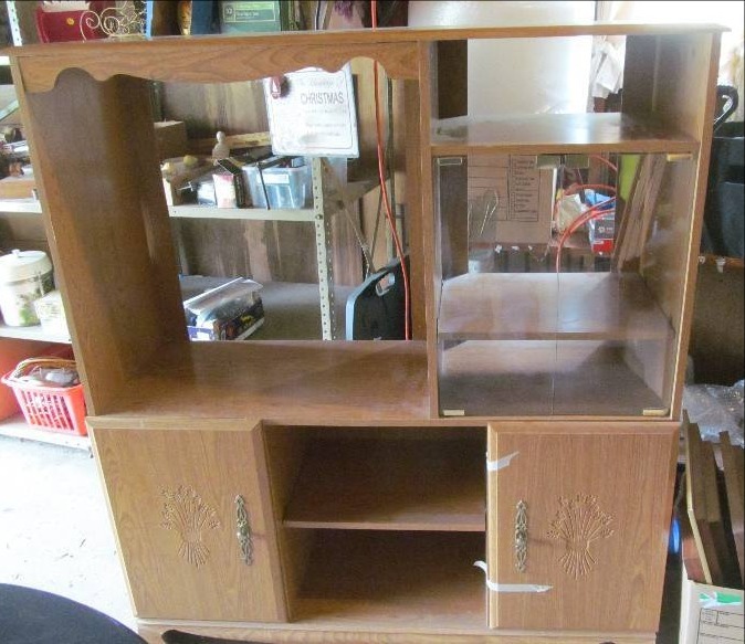 lot 64 image: Entertainment Center