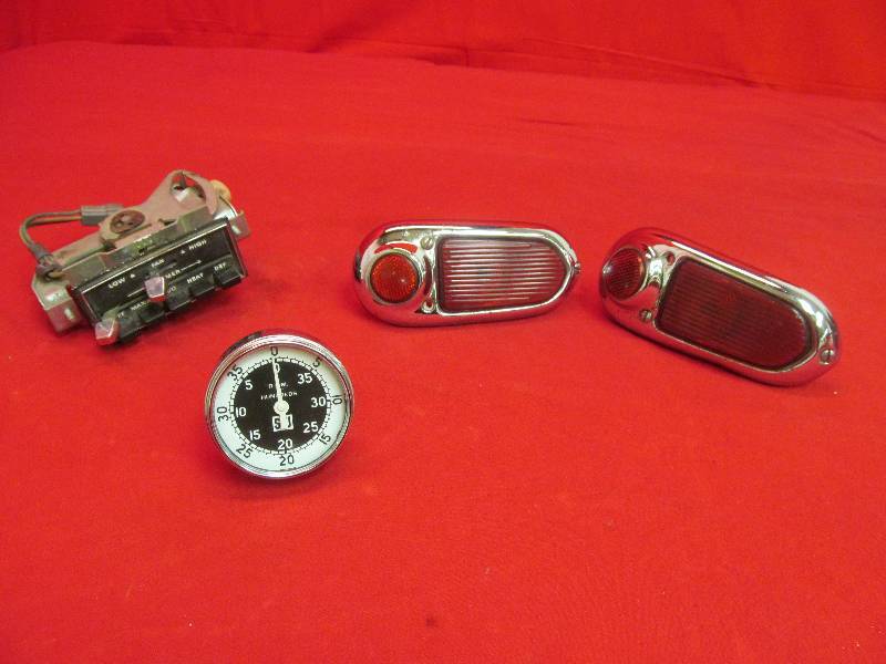 lot 106 image: 1969 to 1972 Mopar Heater Assembly, Stewart Warner RPM Gauge (NOS), 1949 Chevrolet Tail lights