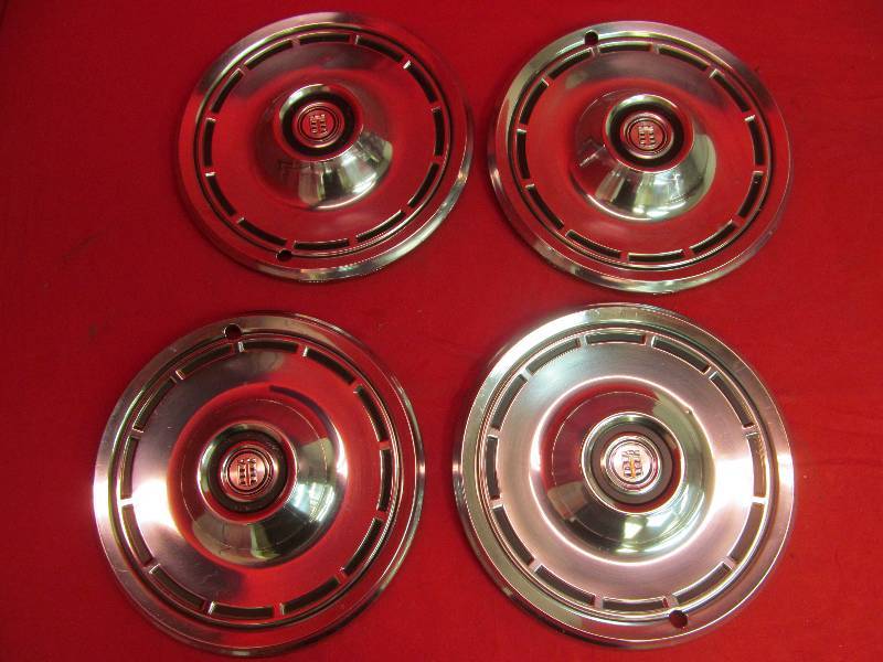lot 130 image: Set of 4 Vintage Chrysler Rims