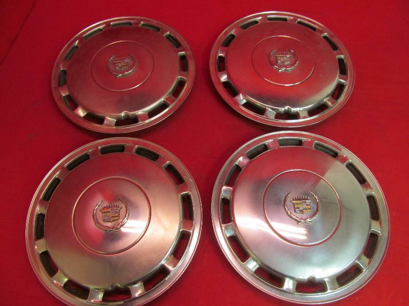 lot 133 image: Set if 4 Vintage Cadillac Rims