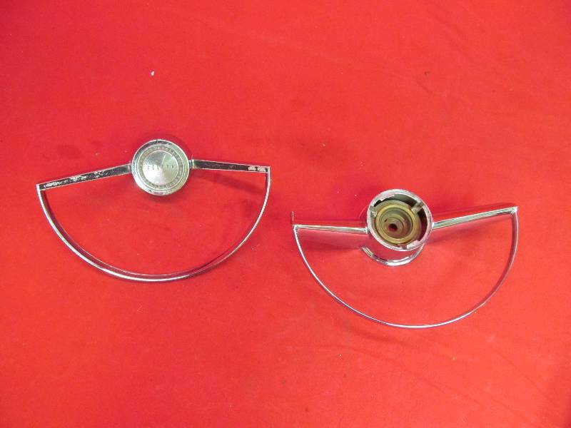 lot 135 image: 1950s Pontiac Steering Wheel horn Ring, 1960s Ford Falcon