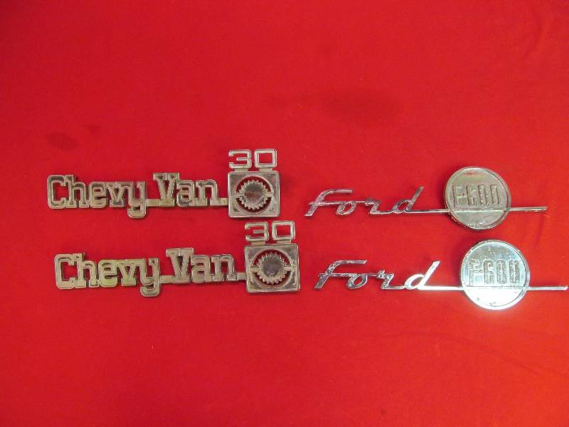 lot 139 image: Chevy Van 30 Emblems, Mid 1950s Ford F-600 Truck Emblems