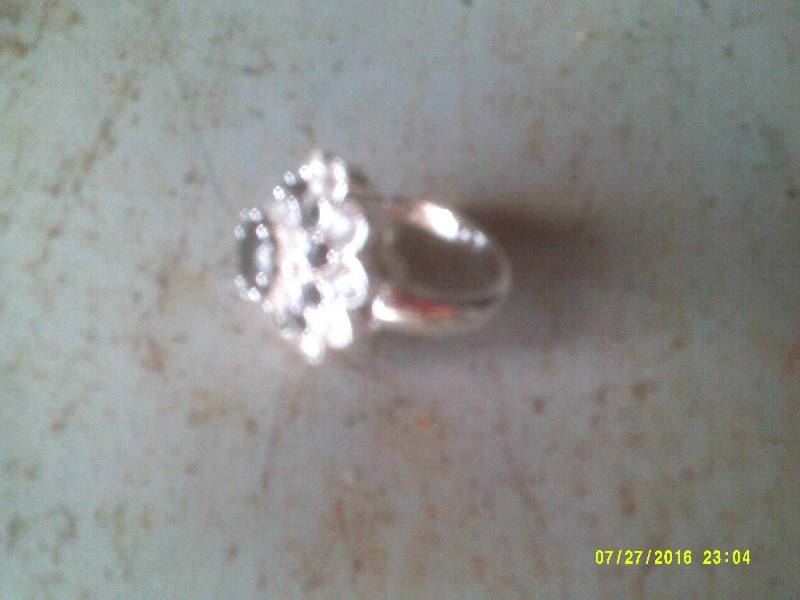 SZ 6 RING DIAMONDS AND BLACK STONE