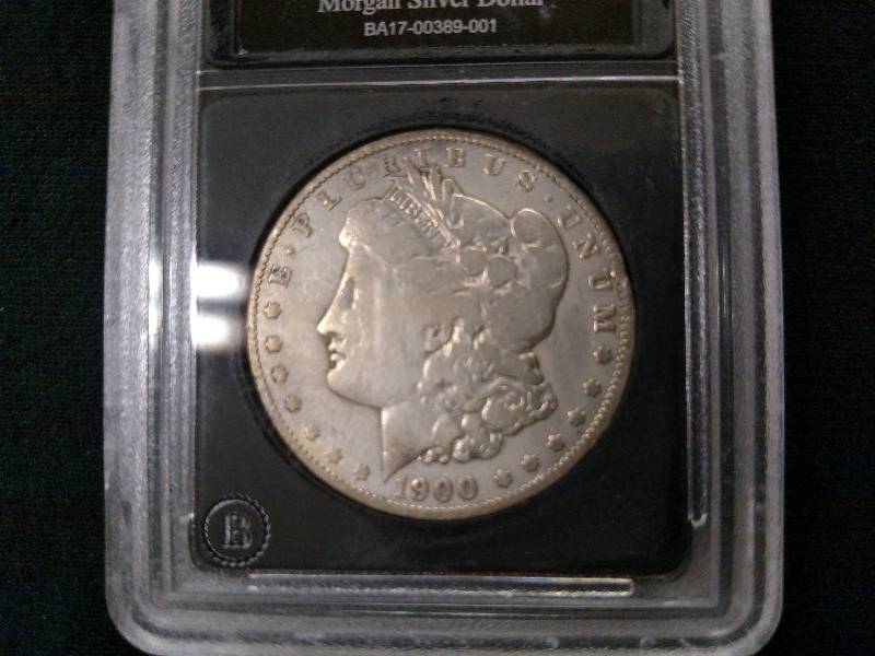1900 OCC Morgan Silver Dollar...