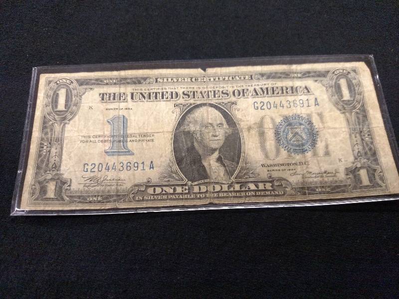1934 Funny Back One Dollar Silver C...