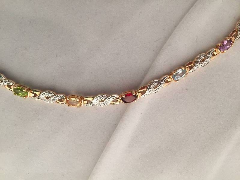 lot 92 image: Sterling Silver Gemstone Bracelet
