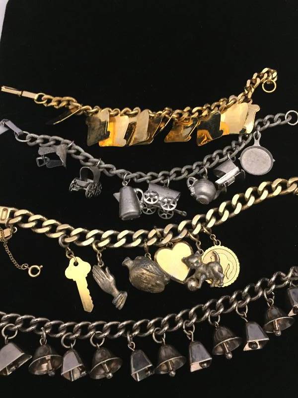 lot 73 image: 4 Charm Bracelets