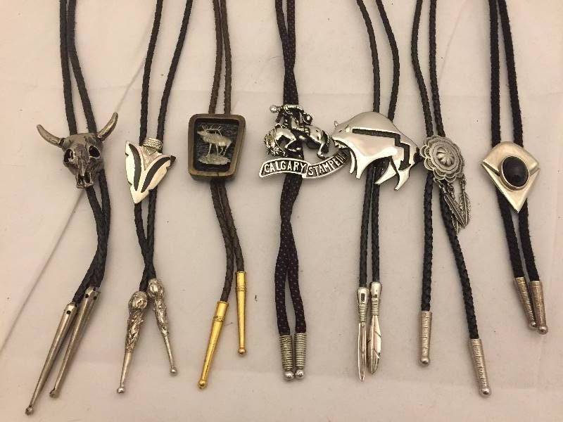 lot 82 image: 7 Bolo Ties