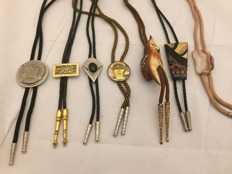 lot 112 image: 7 Bolo Ties