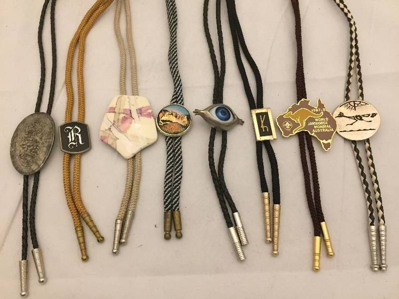 lot 160 image: 8 Bolo Ties
