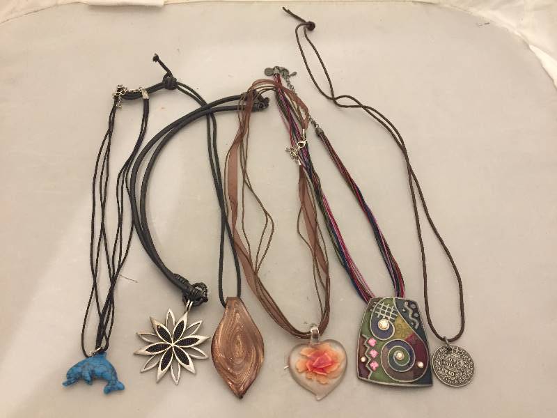 lot 117 image: Necklaces - Pendants on Cords  Ribbons